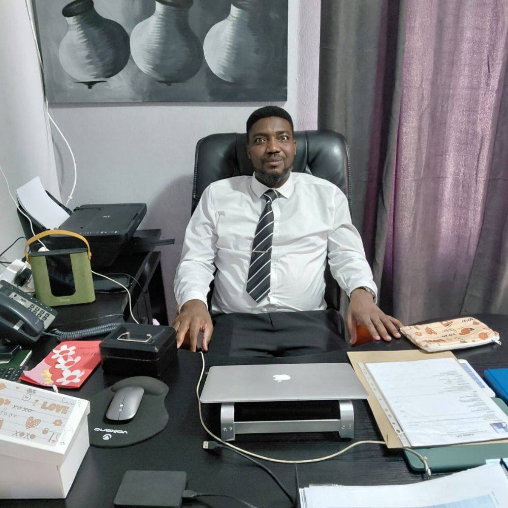 Calvin Manganye at his office desk